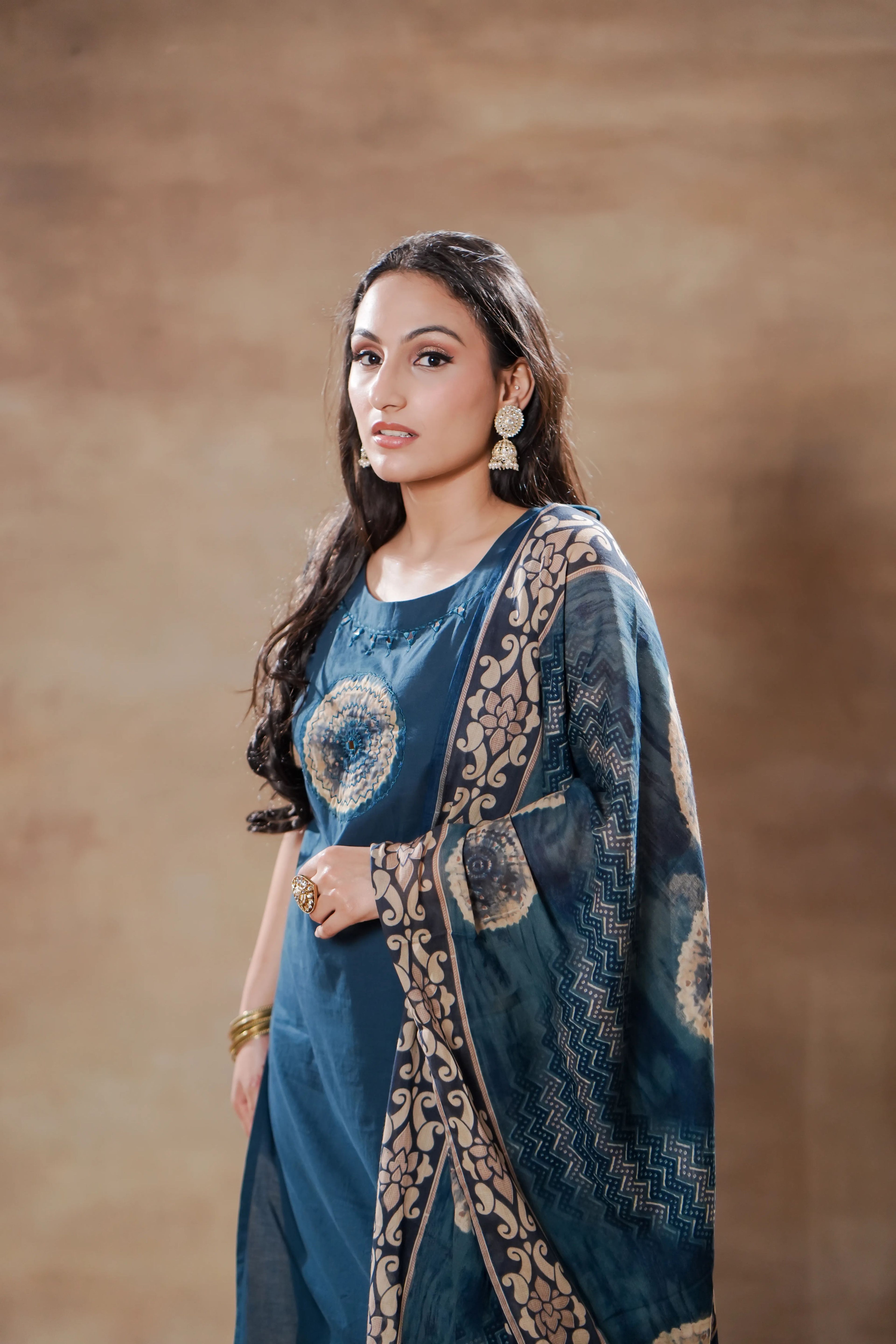 Indigo Breeze sleeveless cotton kurta set by Shuchi Man featuring a traditional Indian kurta with matching pants and dupatta.