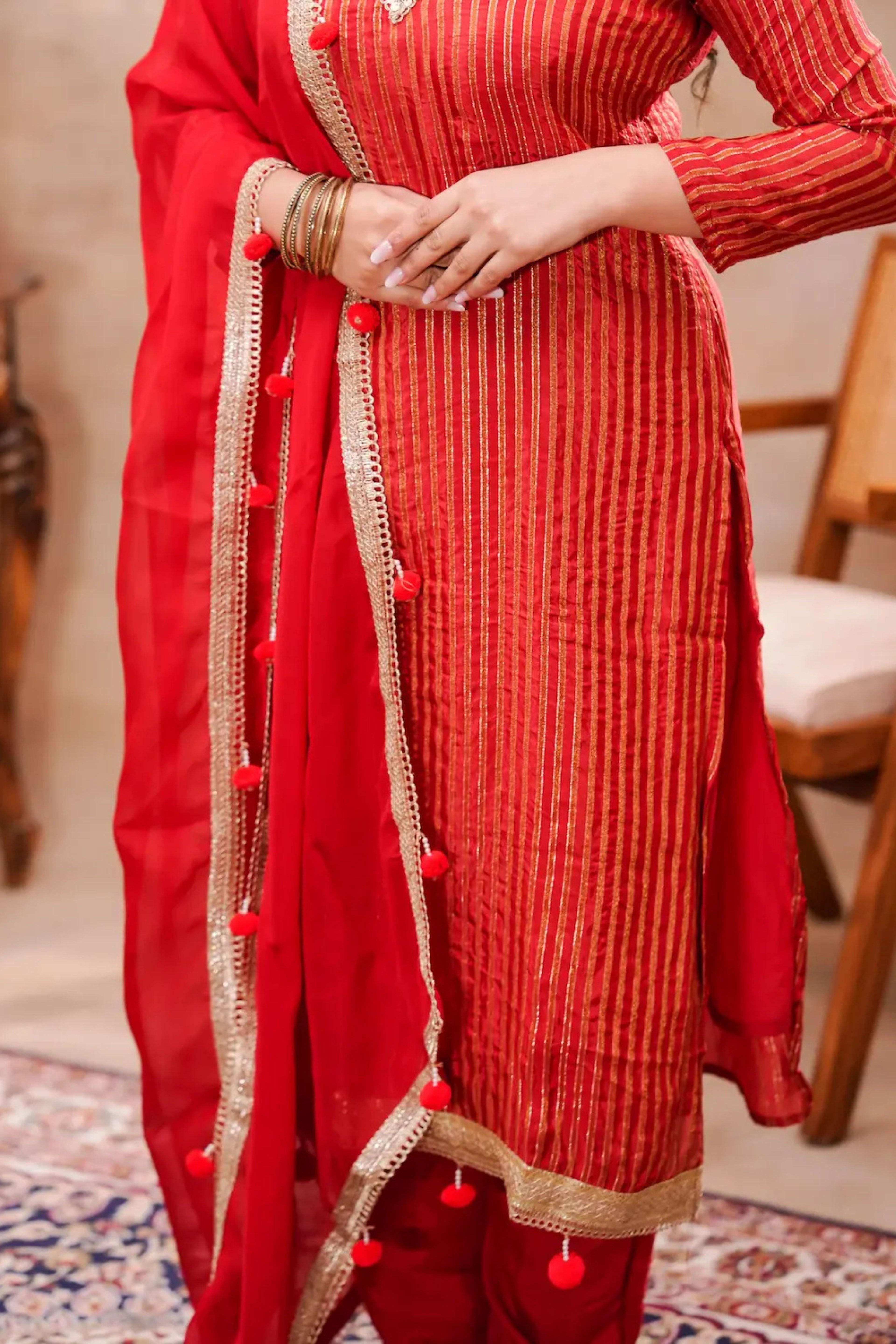 Crimson Grace silk kurta set with matching dupatta by Shuchi Man, featuring elegant traditional Indian design and intricate details.