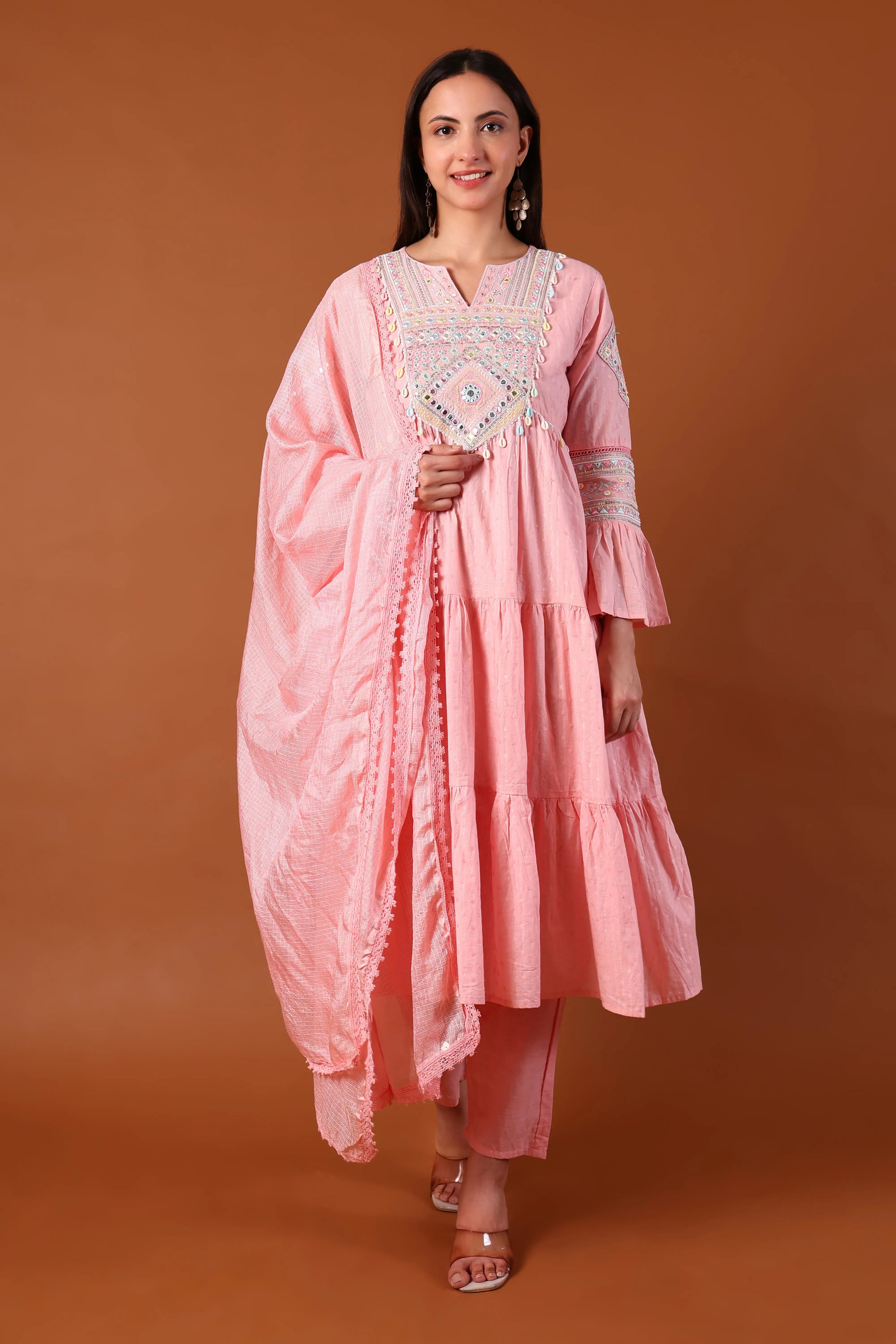 Shuchi Man blush cotton kurta set with Kauri embellishments, featuring intricate embroidery and a comfortable, stylish design.