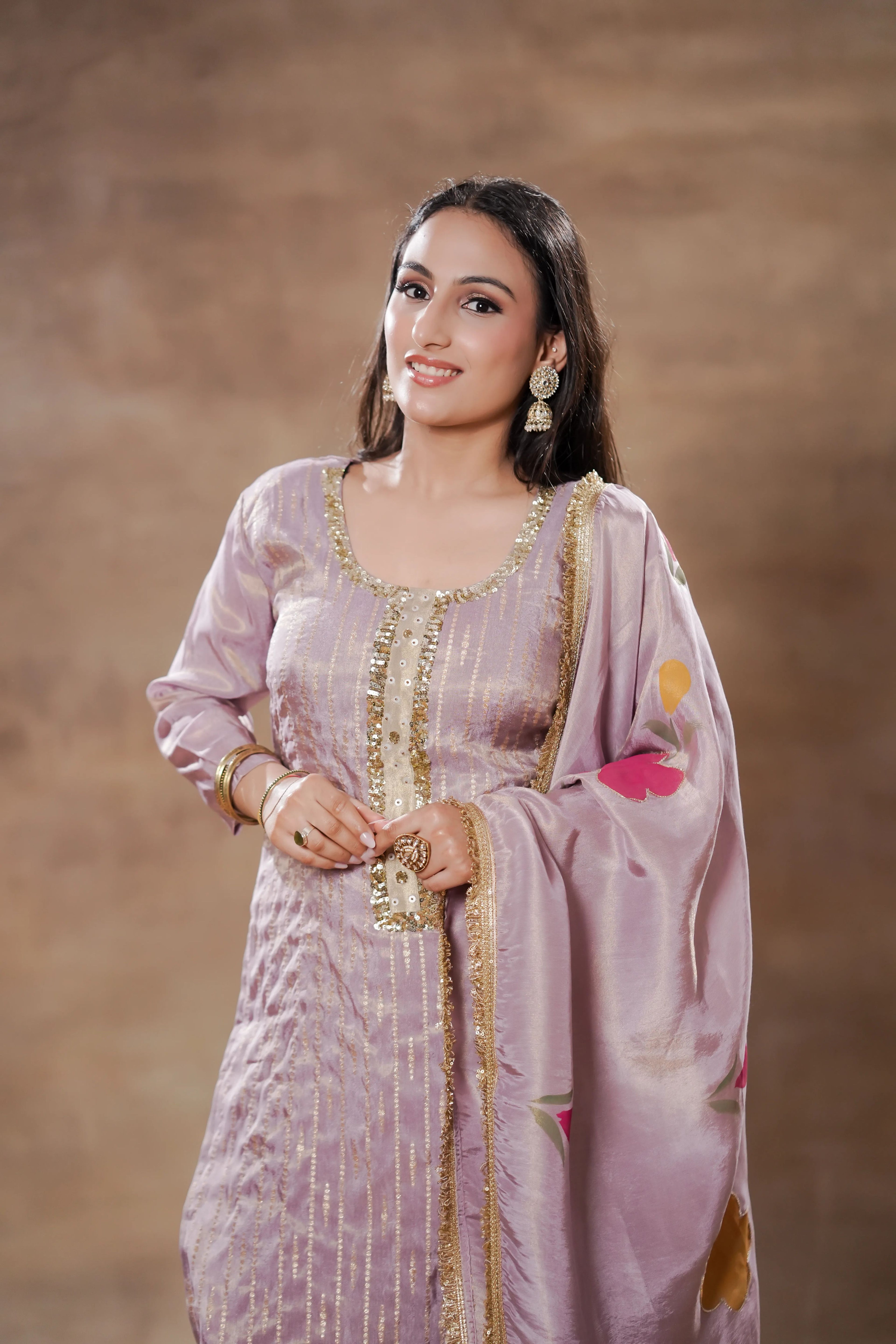 Lavender Radiance Tissue Silk Kurta Set by Shuchi Man featuring a flowy, elegant kurta with intricate detailing and matching churidar.