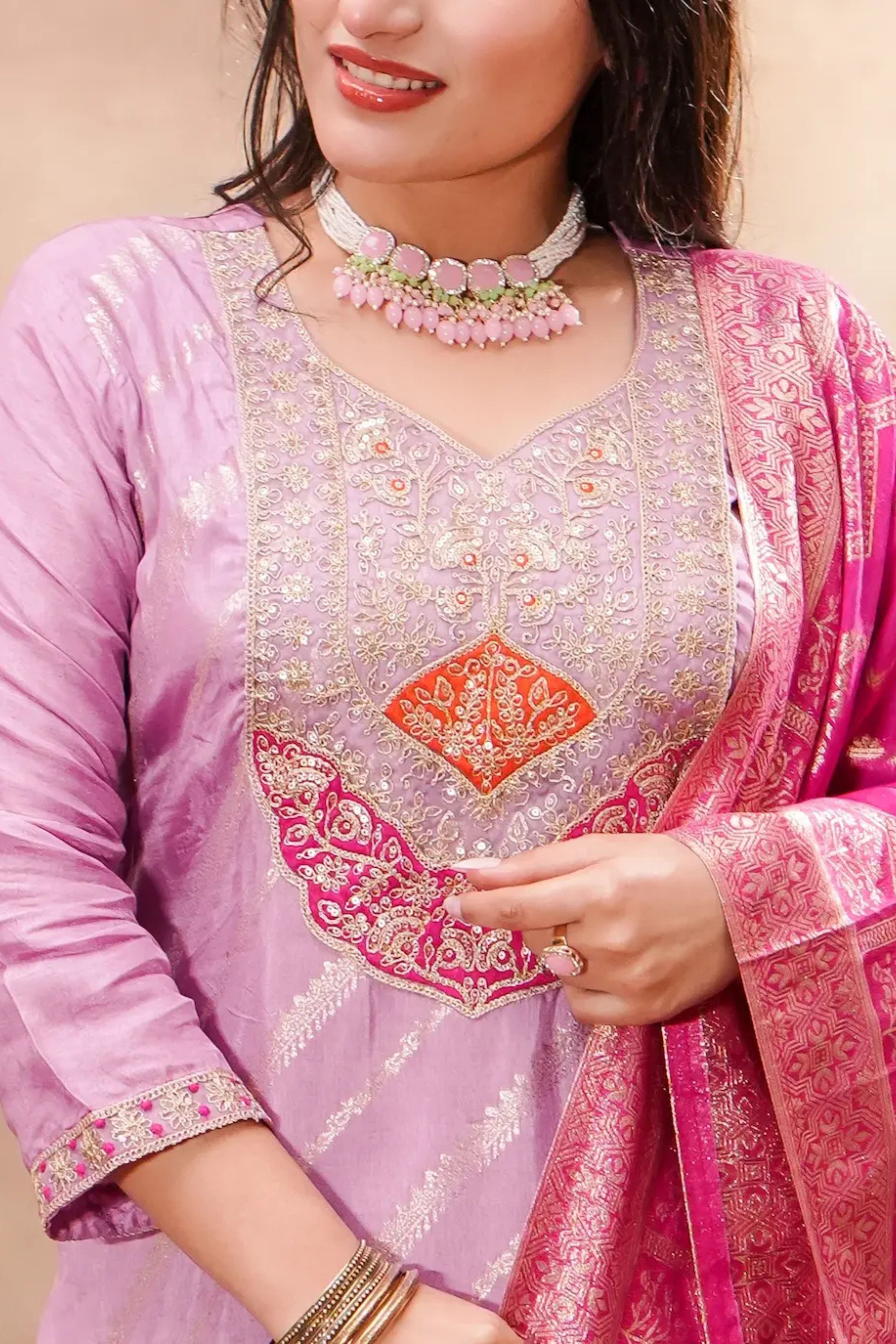 Lavender silk kurta with intricate detailing paired with a Banarasi dupatta from Shuchi Man.