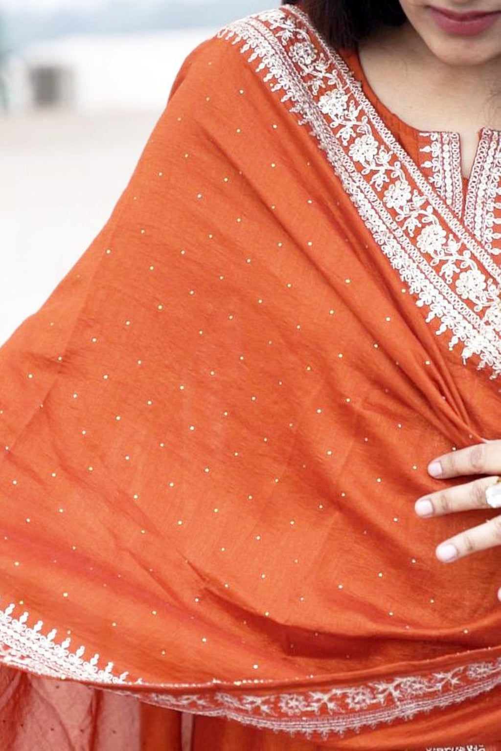 Rust Radiance Silk Anarkali set by Shuchi Man featuring a flowing silk Anarkali with intricate embroidery and matching dupatta.