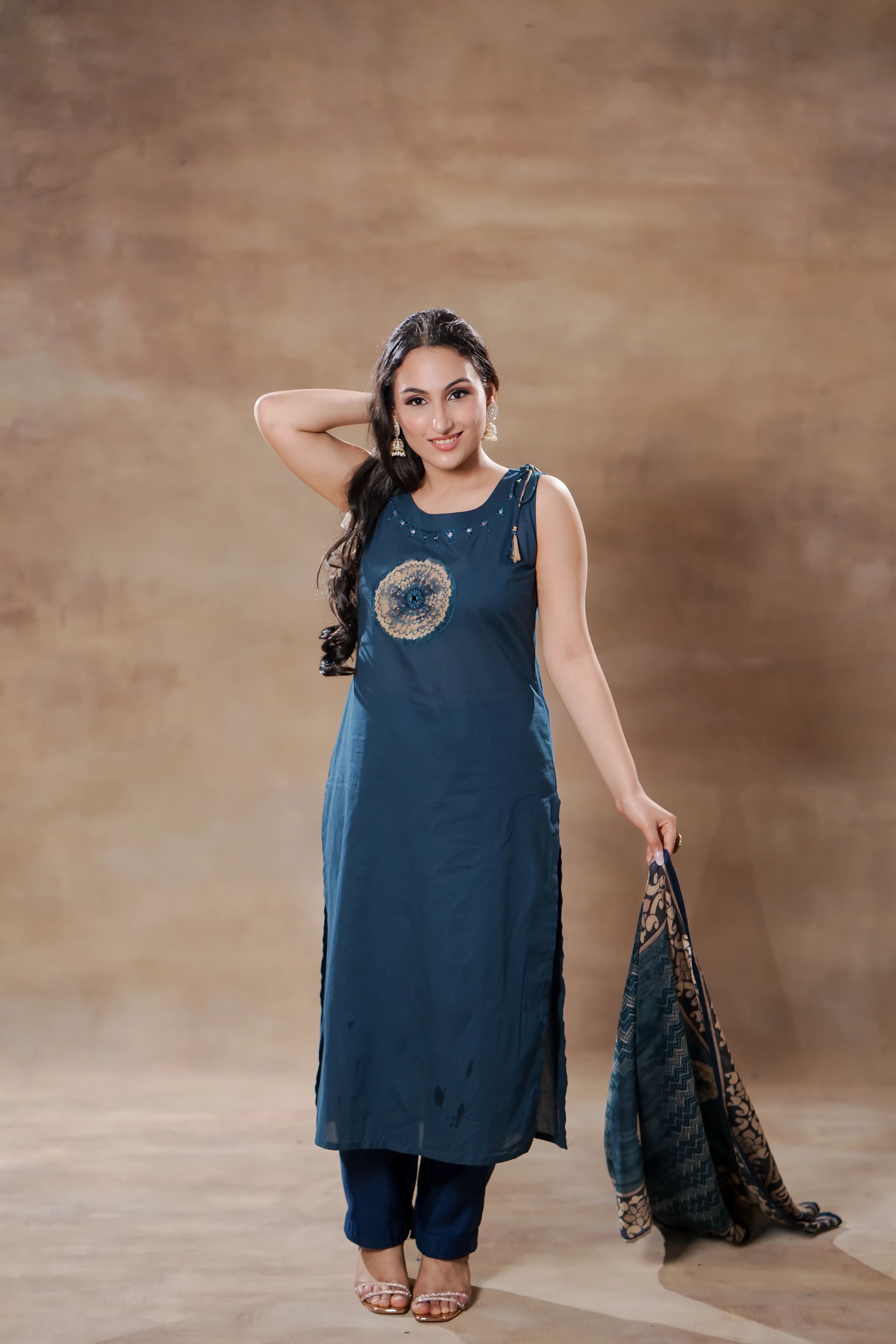 Indigo Breeze sleeveless cotton kurta set by Shuchi Man featuring a traditional Indian design with vibrant blue fabric and comfortable fit.