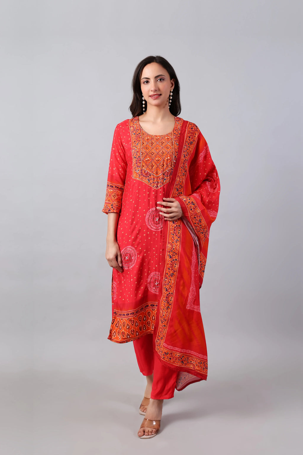 Red Bandhej rayon kurta set with matching dupatta by Shuchi Man, featuring traditional print and comfortable fit.