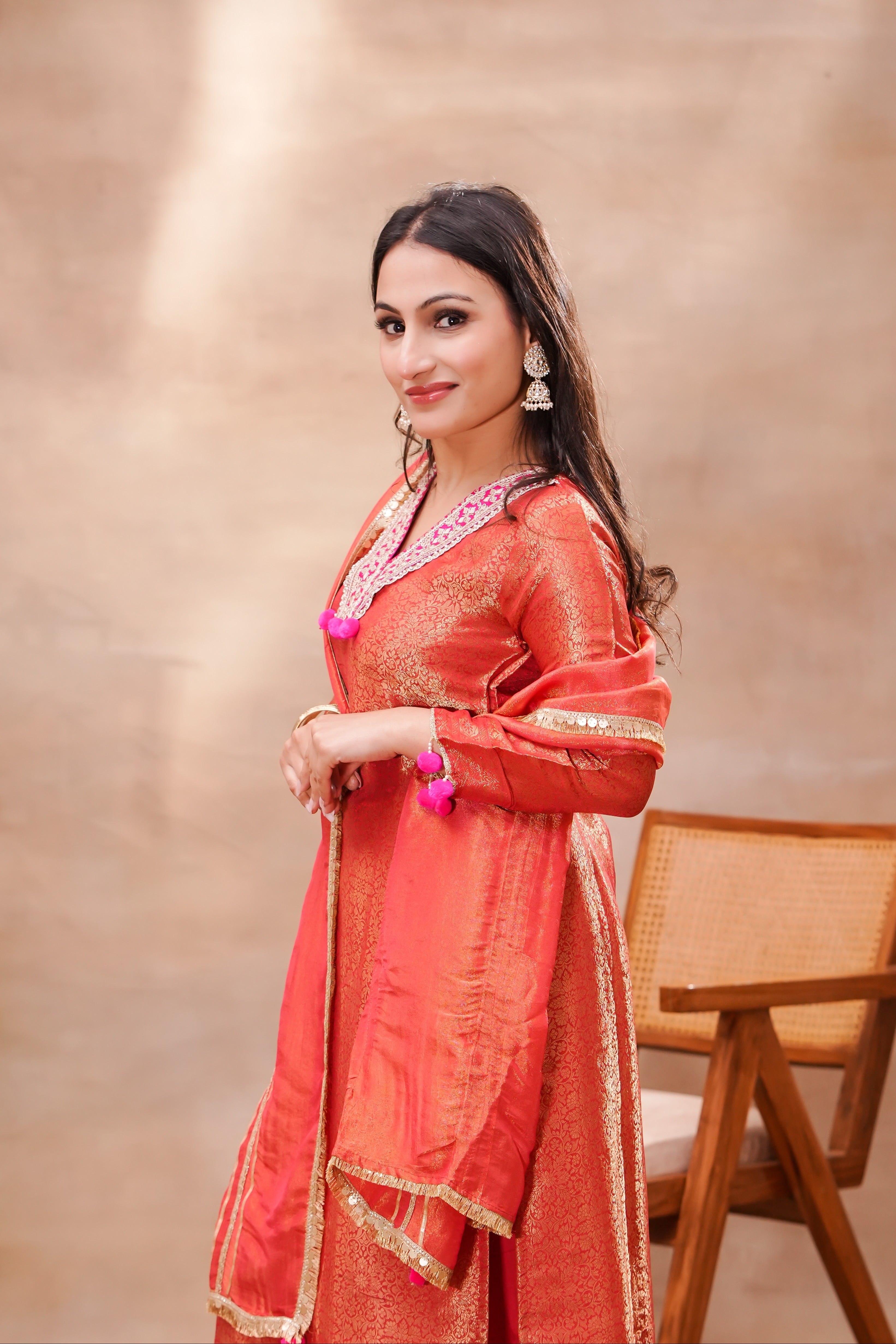 Vermilion brocade silk kurta set with matching silk dupatta, traditional festive attire by Shuchi Man, featuring intricate embroidery.