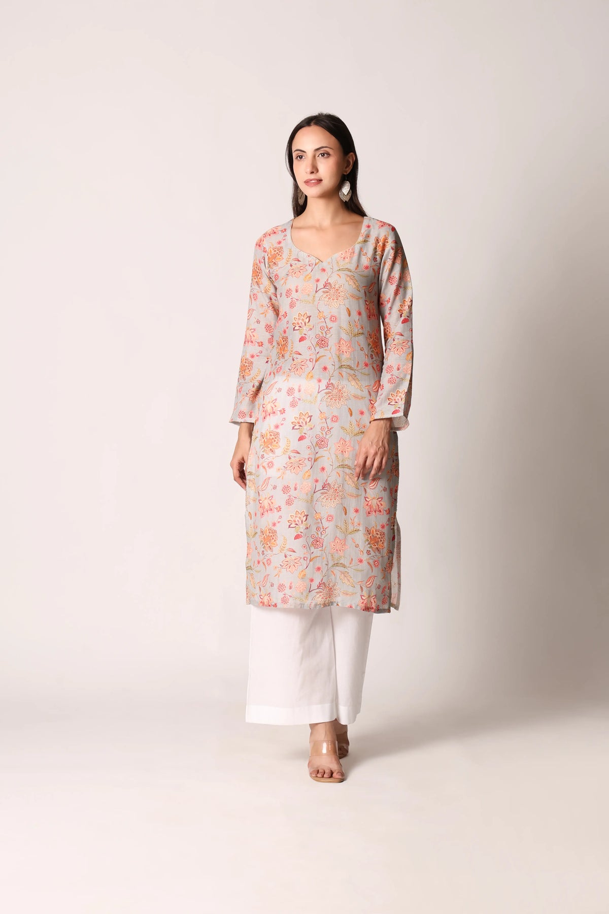 Pastel aqua linen viscose printed kurta by Shuchi Man, showing a stylish traditional top with floral patterns and a relaxed fit.