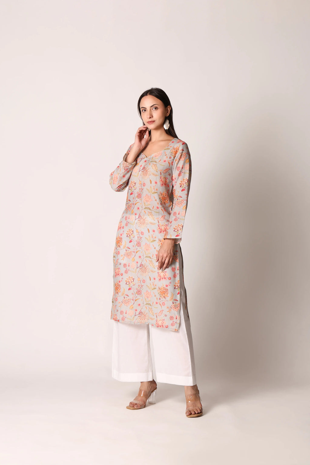 Pastel aqua linen viscose printed kurta by Shuchi Man featuring floral patterns and a relaxed fit, ideal for casual and festive wear.