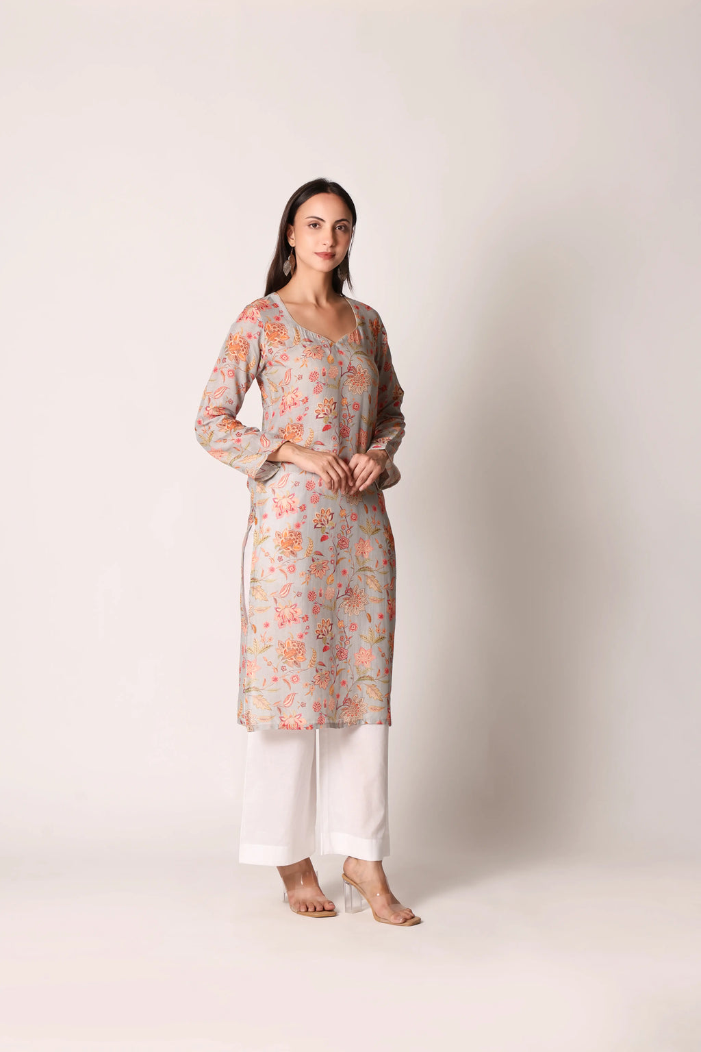 Pastel aqua linen viscose printed kurta by Shuchi Man featuring floral patterns and a relaxed fit.