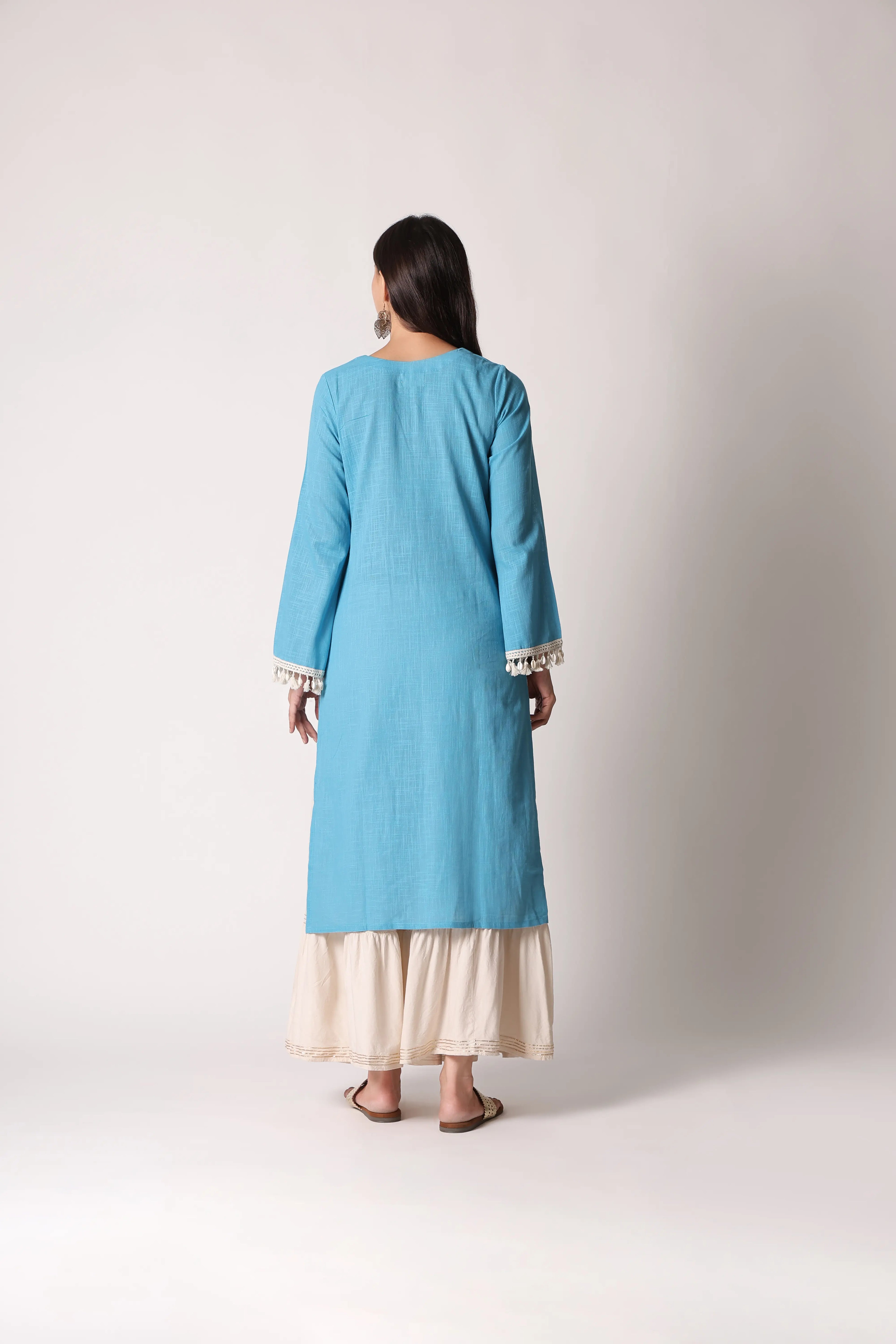 Neeli Nazm by Shuchi Man, featuring elegant calligraphy on white paper with intricate floral border design.