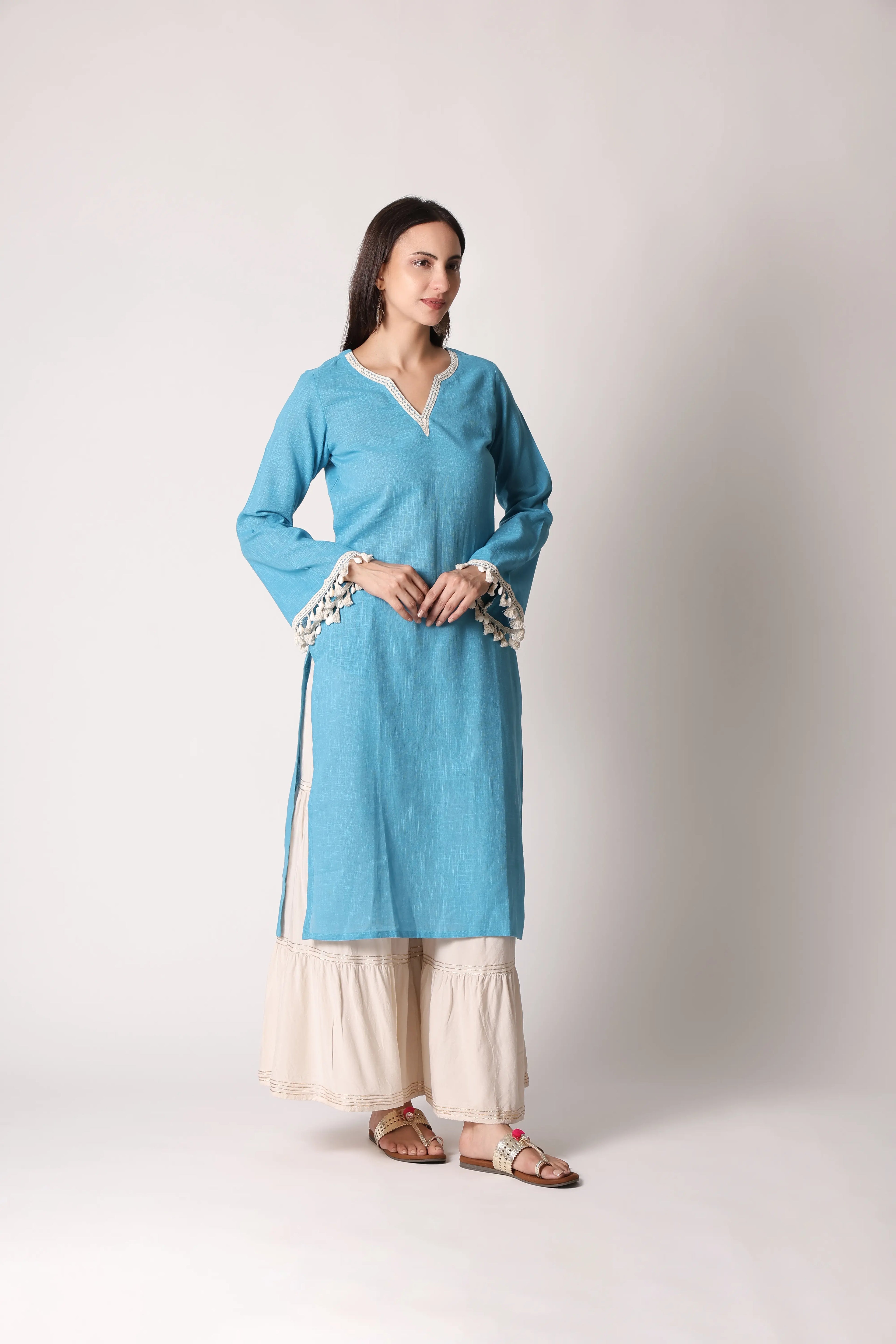 Neeli Nazm by Shuchi Man, featuring vibrant traditional textile with intricate patterns and rich blue hues, on a flat surface.
