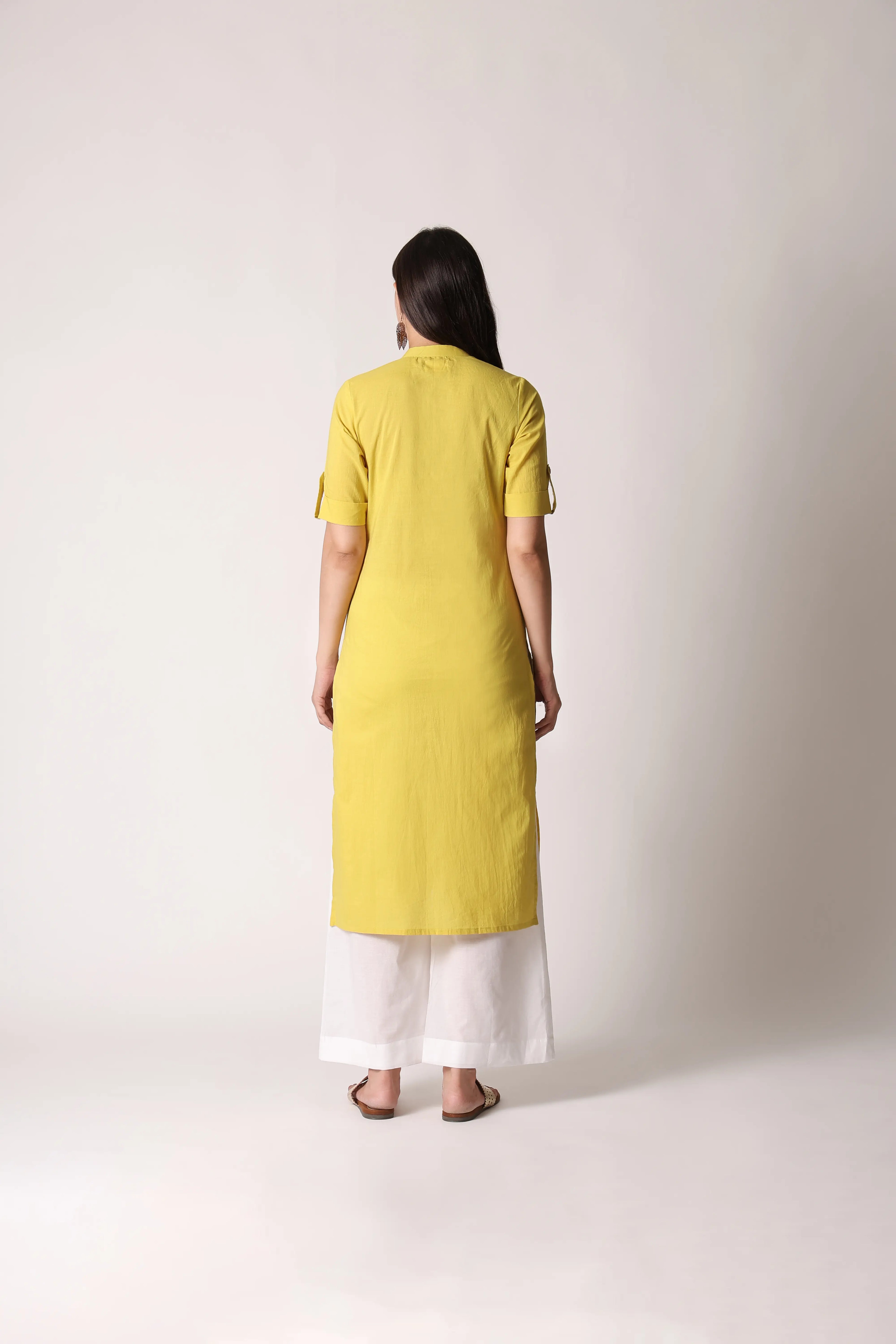 Shuchi Man Acacia Edit cotton kurta with intricate embroidery and a relaxed fit, featuring a neutral color and traditional design.