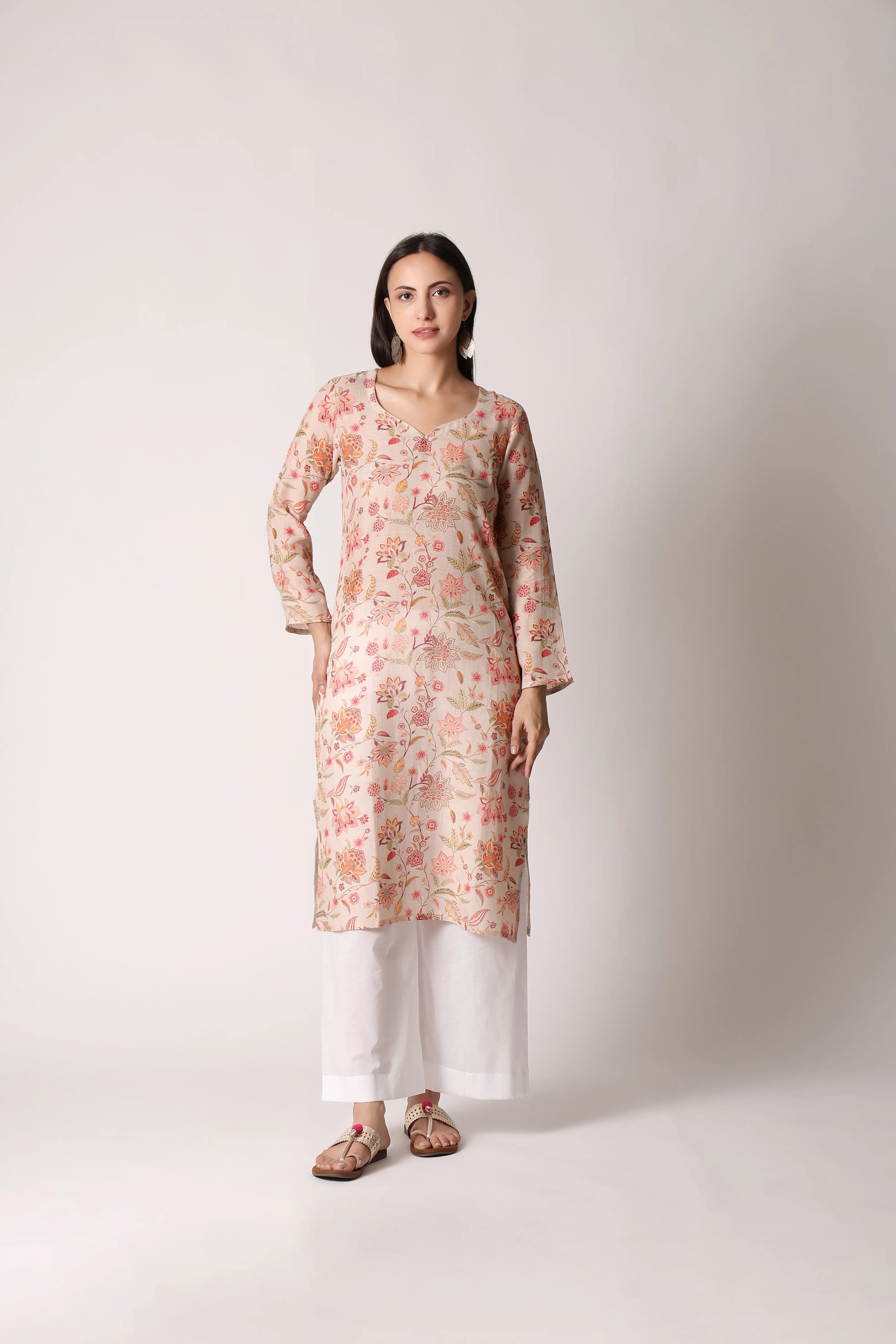 Ivory Reverie Linen Viscose Printed Kurta by Shuchi Man, showcasing intricate floral patterns and lightweight fabric design.