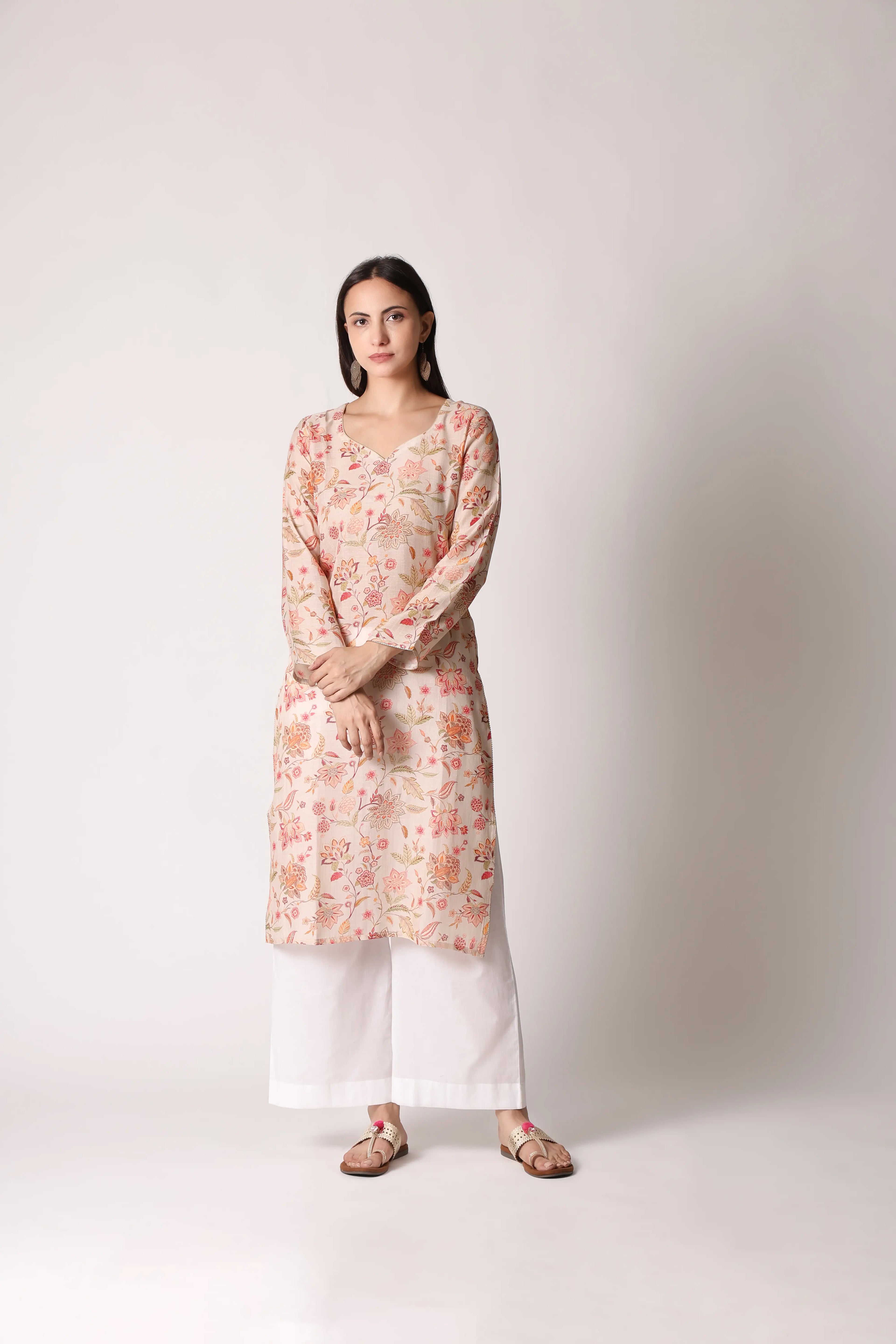 Ivory Reverie Linen Viscose Printed Kurta by Shuchi Man, featuring intricate patterns and a comfortable, flowing fit.