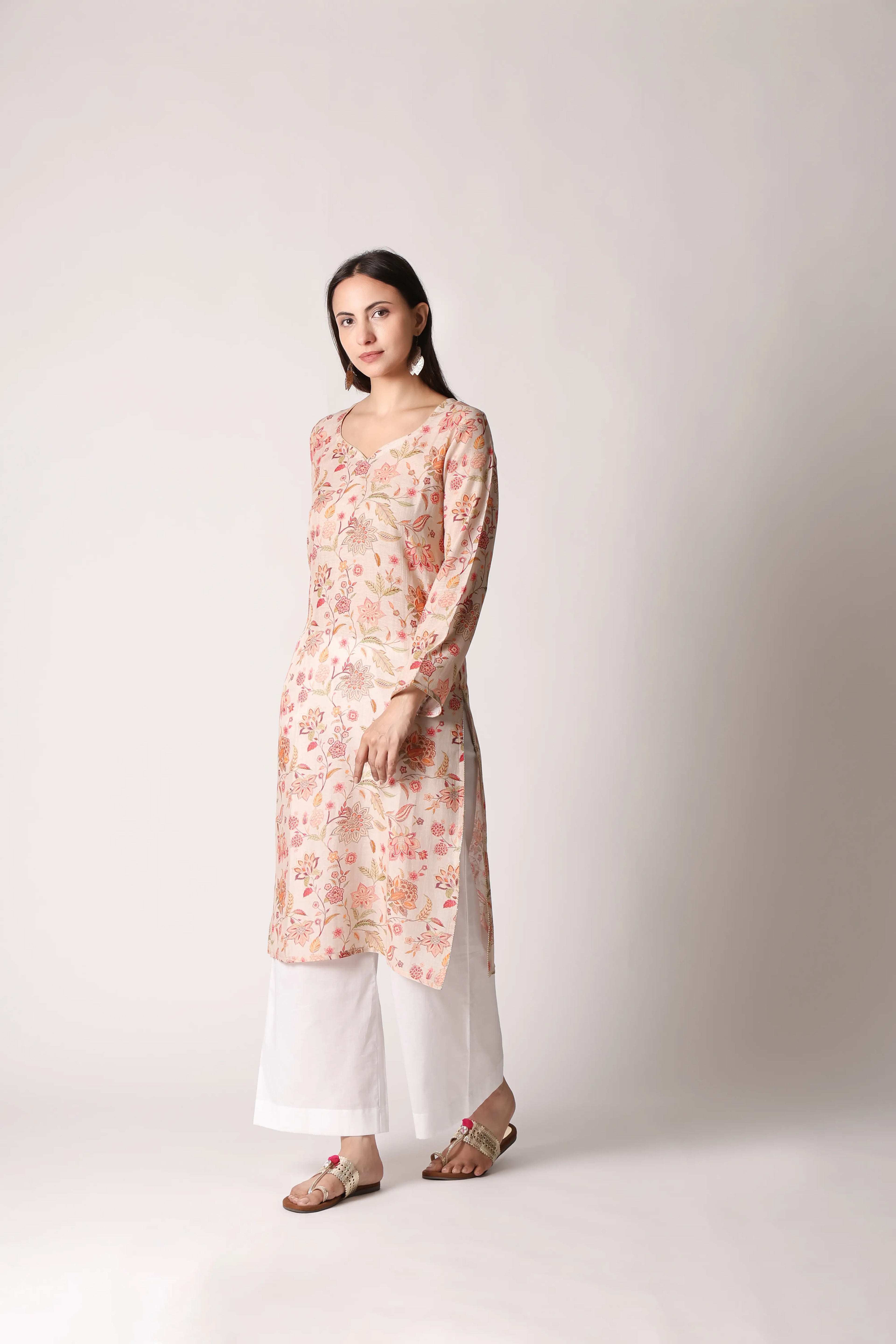 Ivory Reverie linen viscose printed kurta by Shuchi Man featuring intricate patterns and traditional design elements.