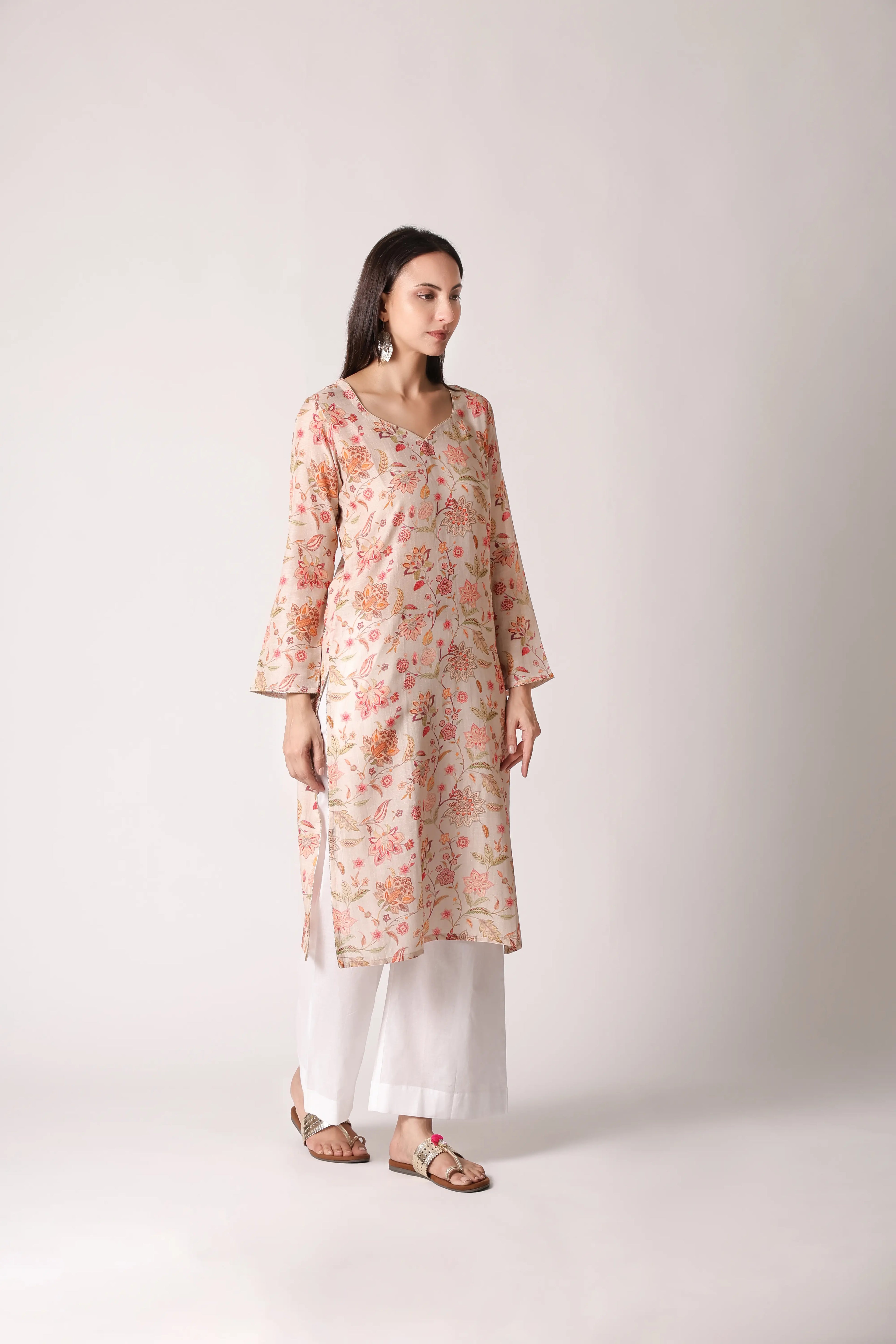 Ivory Reverie linen viscose printed kurta by Shuchi Man, featuring elegant floral patterns and a comfortable fit.