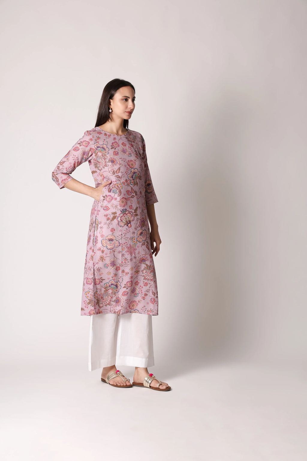 Lilac Lilt Pure Linen Printed Kurta by Shuchi Man displayed on a hanger with intricate floral patterns and lightweight fabric.