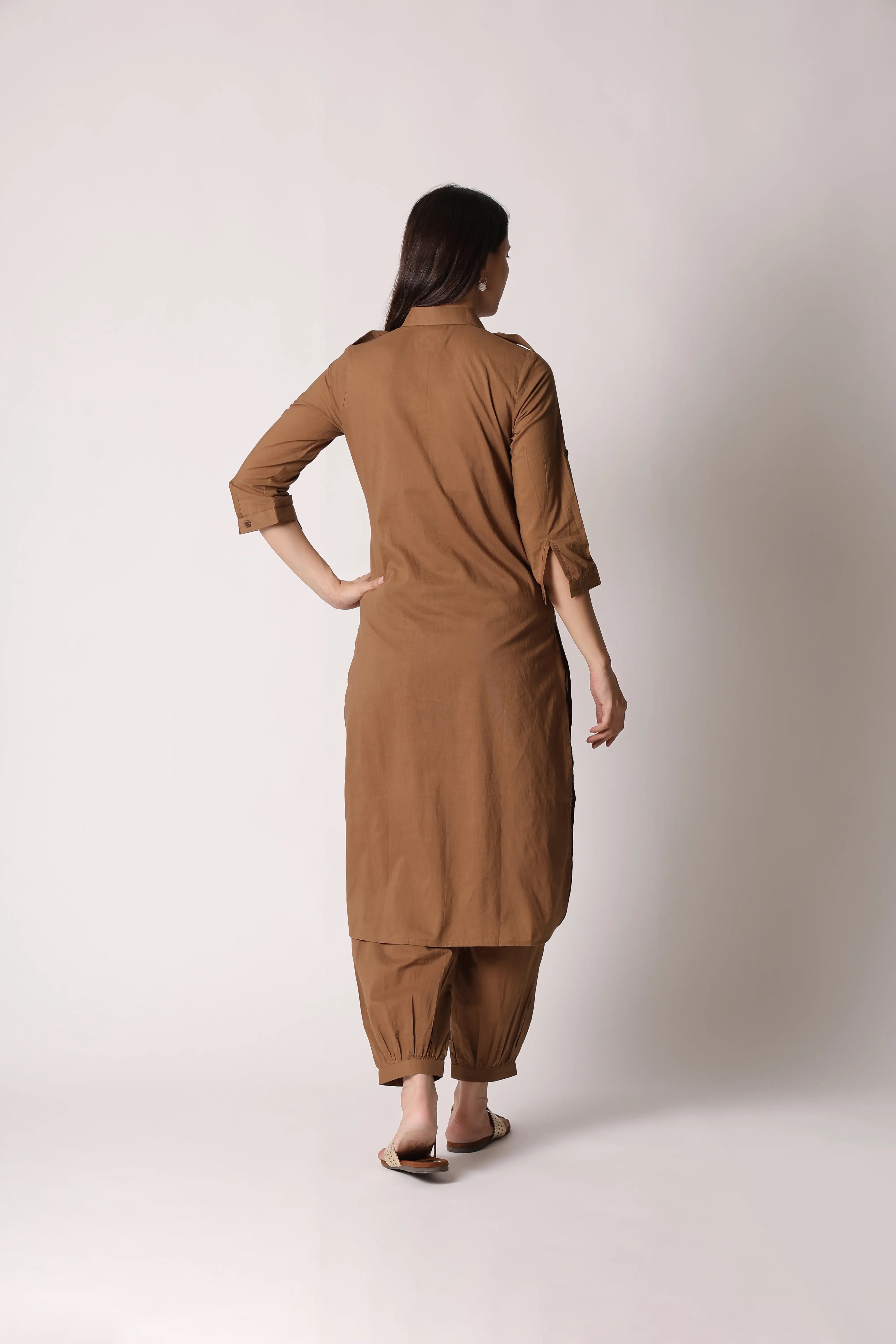 Shuchi Man khaki Nomad Pathani co-ord set featuring a traditional kurta and matching pants, stylish and comfortable ensemble.