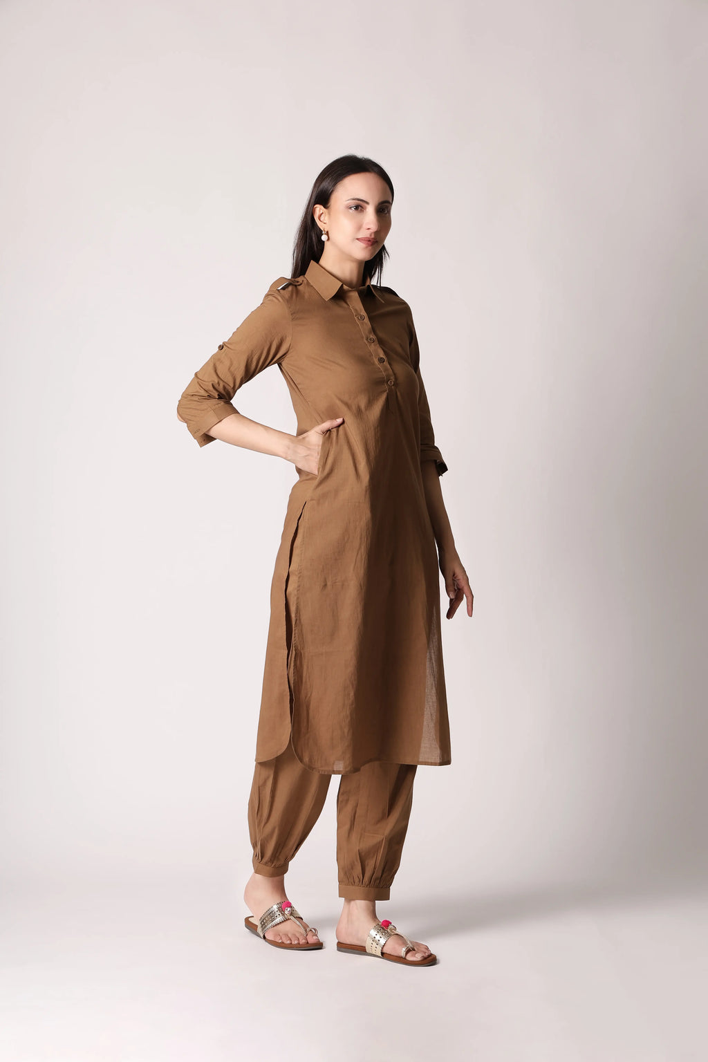 Khaki Nomad Pathani co-ord set by Shuchi Man featuring traditional Indian style fabric and design, displayed on a hanger.