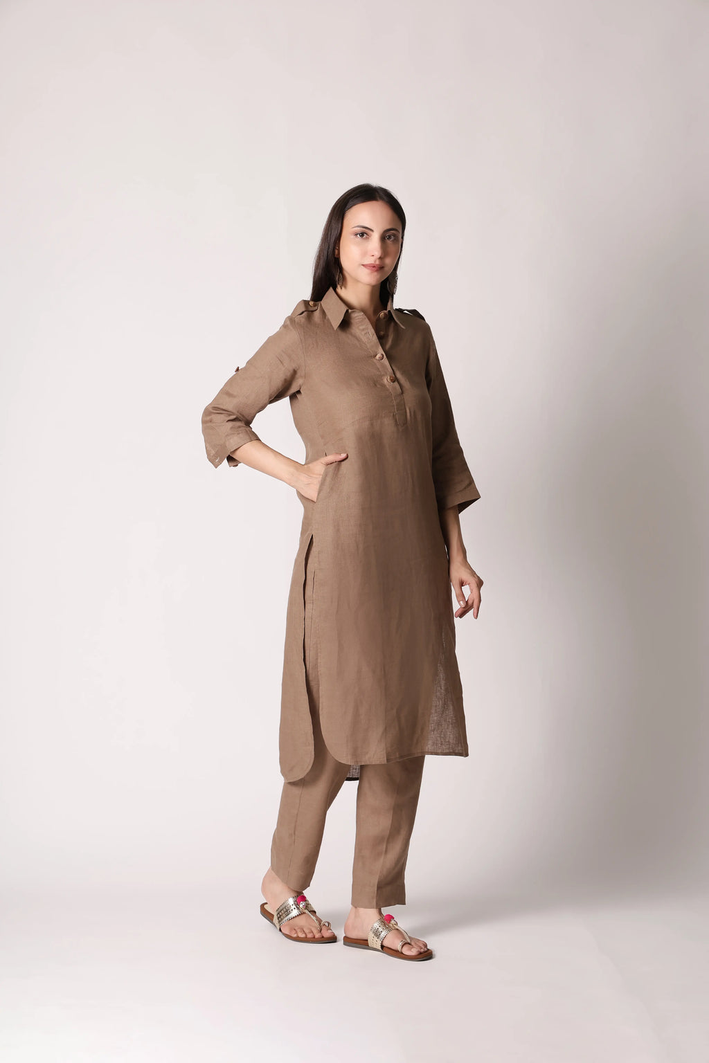 Shuchi Man Dune Khaki Atelier Pure Linen Pathani Co-ord Set displayed on a hanger, showcasing the relaxed fit and lightweight fabric.