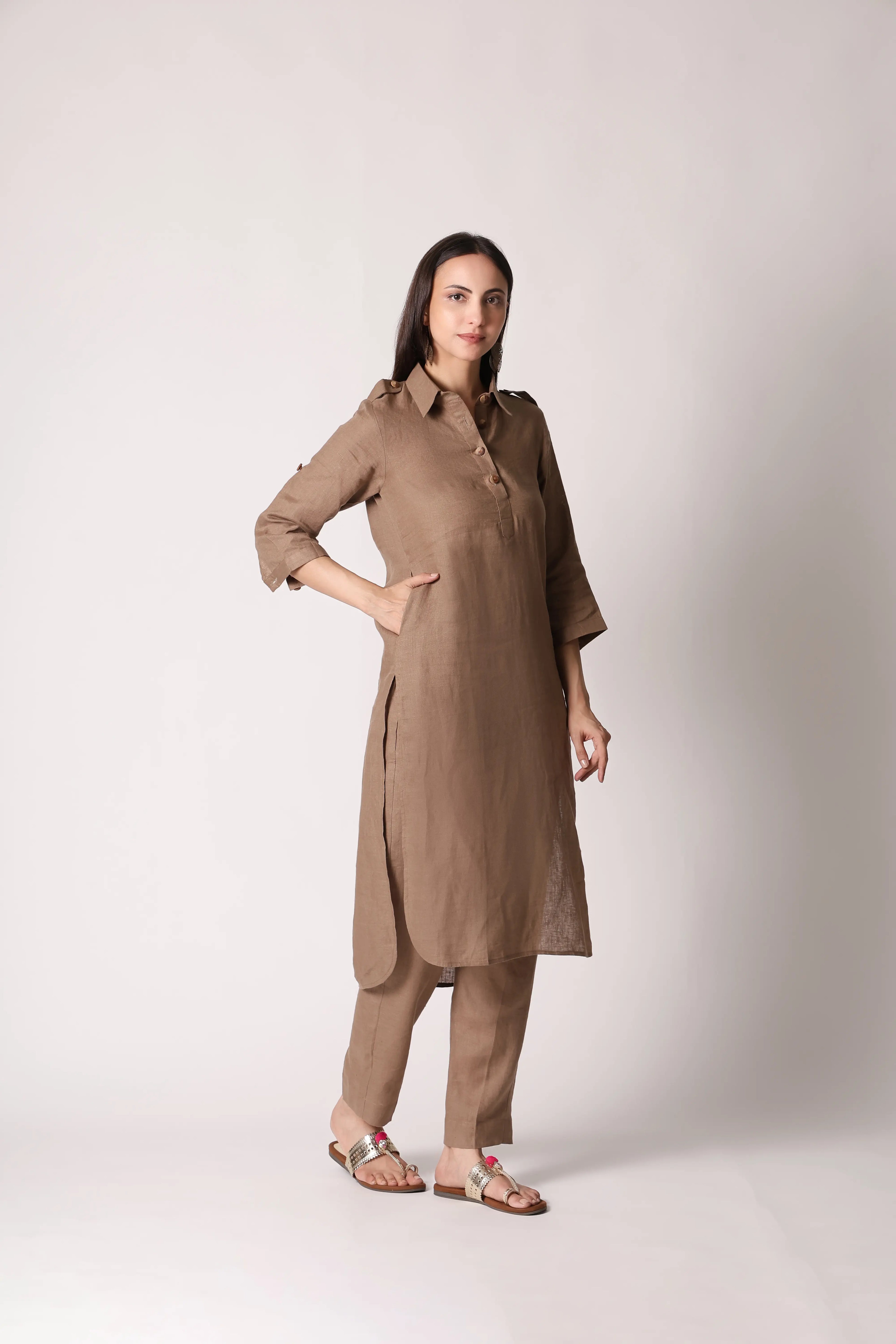 Shuchi Man Dune Khaki Atelier Pure Linen Pathani Co-ord Set displayed on a hanger, showcasing the relaxed fit and lightweight fabric.