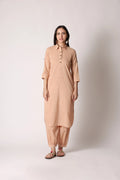 Shuchi Man Sandy Nomad Pathani Co-ord Set featuring a beige kurta and matching pants with subtle patterns and traditional embroidery.