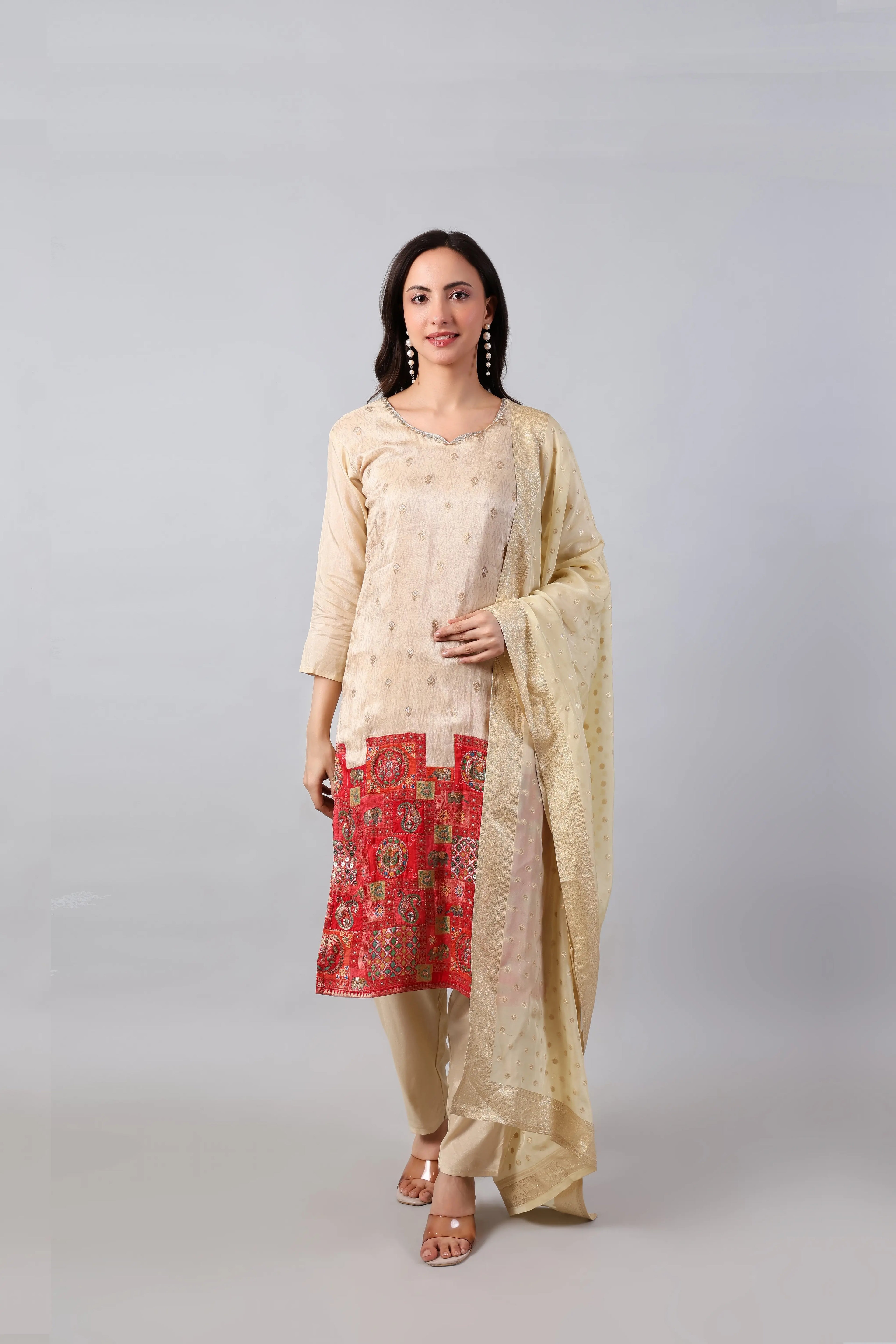 Ivory Russian silk kurta set with matching dupatta from Shuchi Man, featuring elegant traditional embroidery and intricate design.