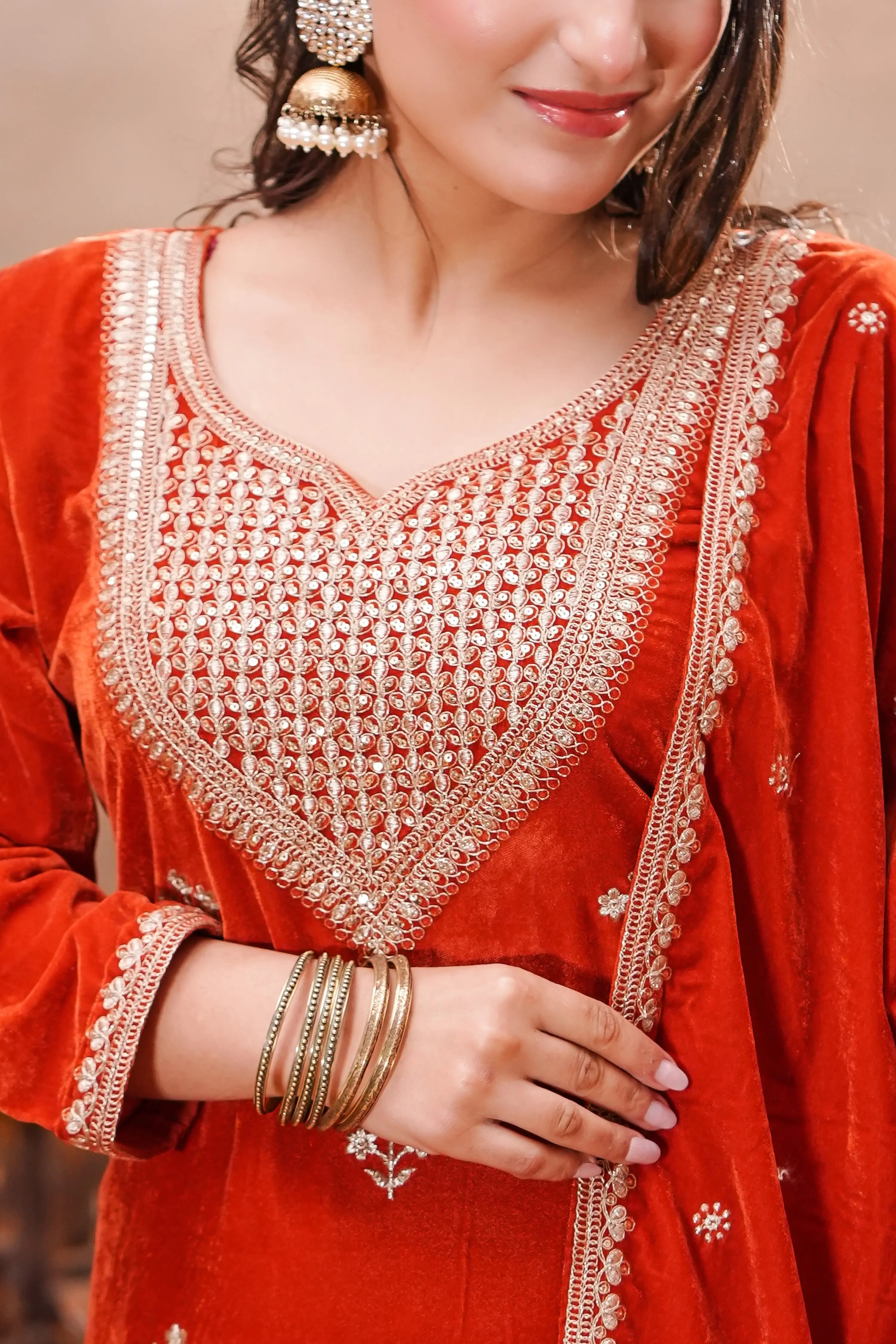 Rust-orange velvet embroidered suit set by Shuchi Man featuring a front view of the Rust Royale Velvet Embroidered Suit Set.