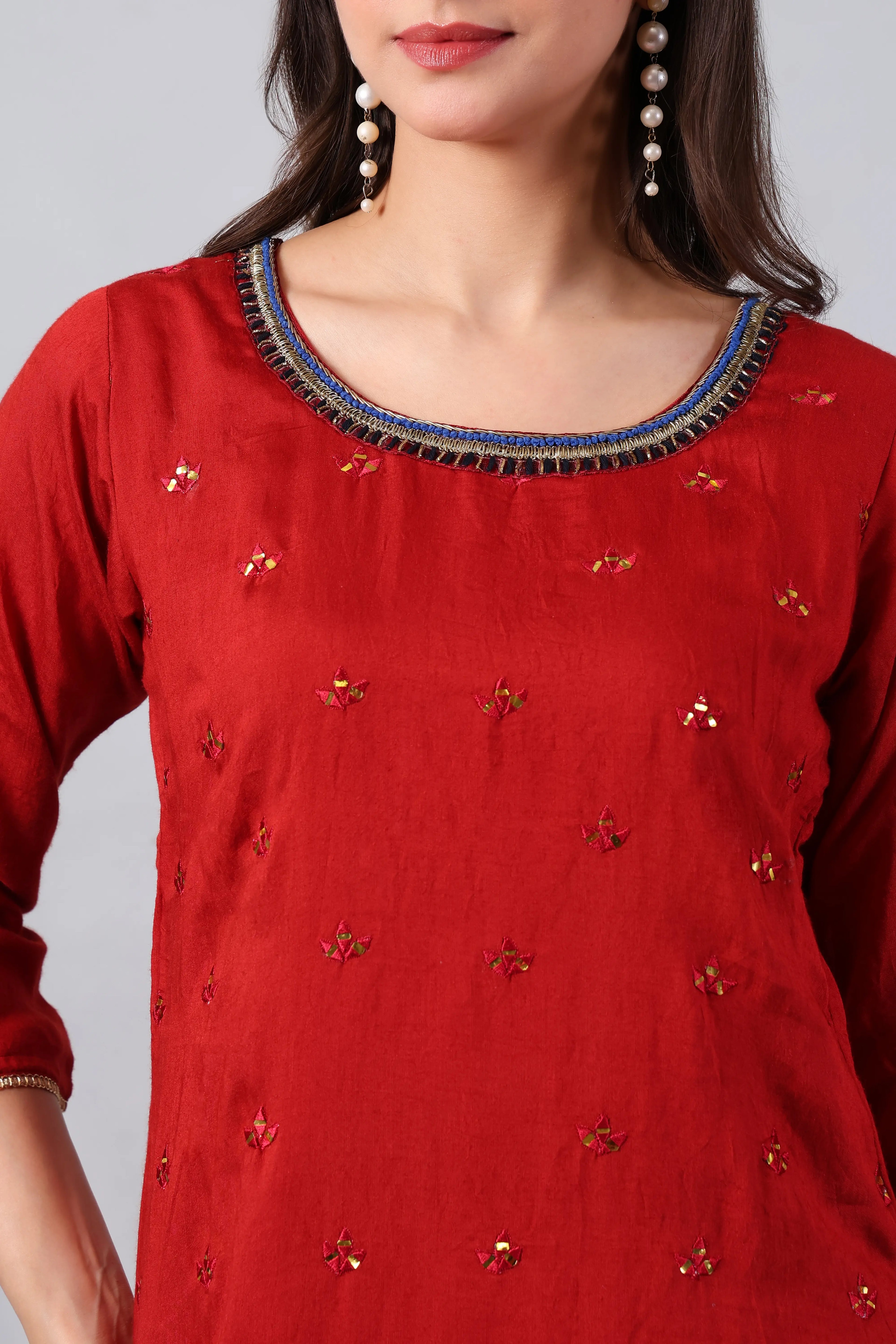 Red silk embroidered kurta with matching palazzo and mehndi green georgette dupatta with zari detailing by Shuchi Man.